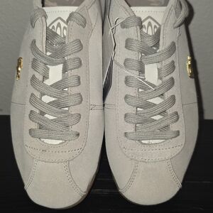 Lacoste Gray Sneakers with Gold Accents